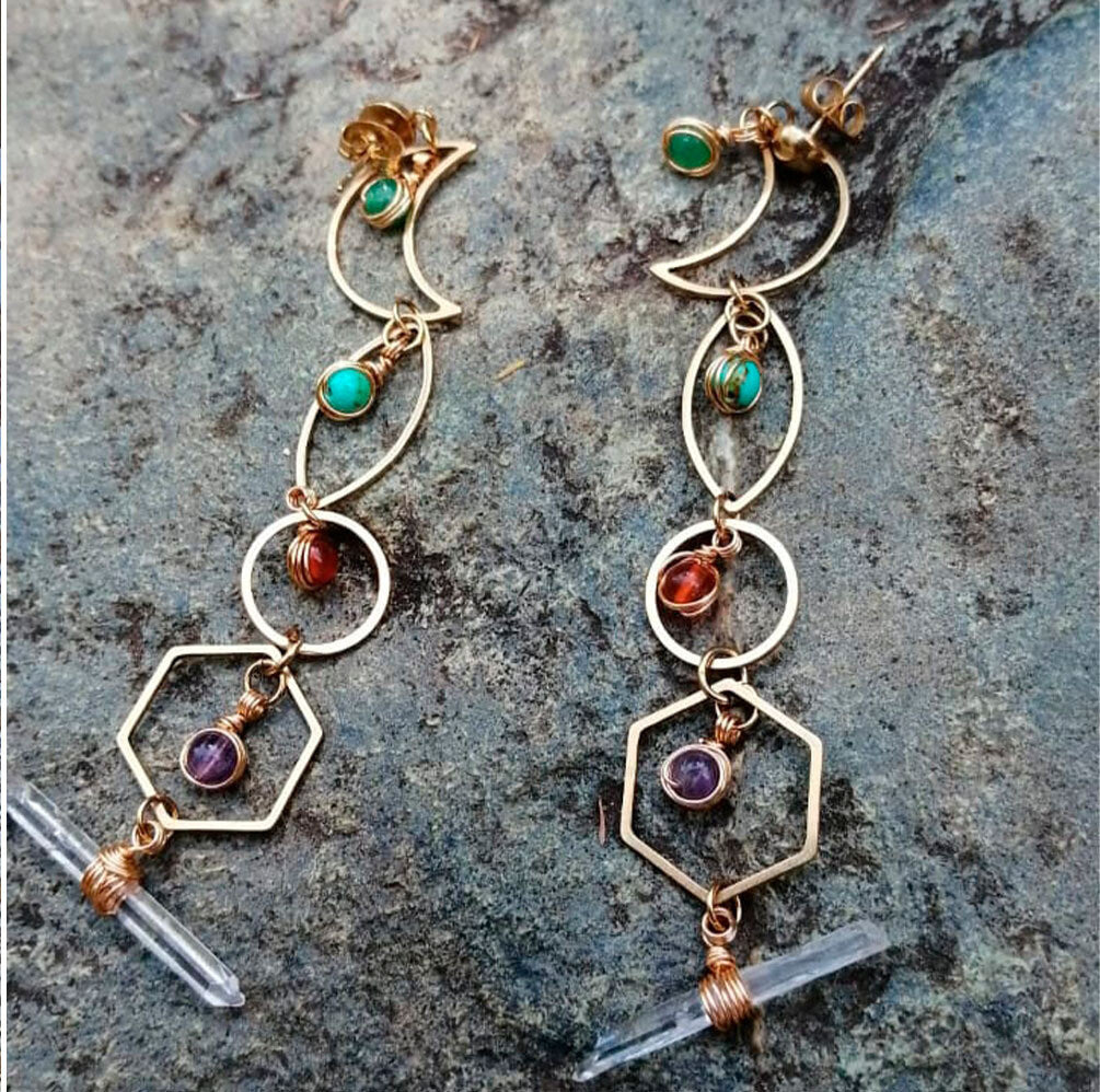 Aretes mujer medicina