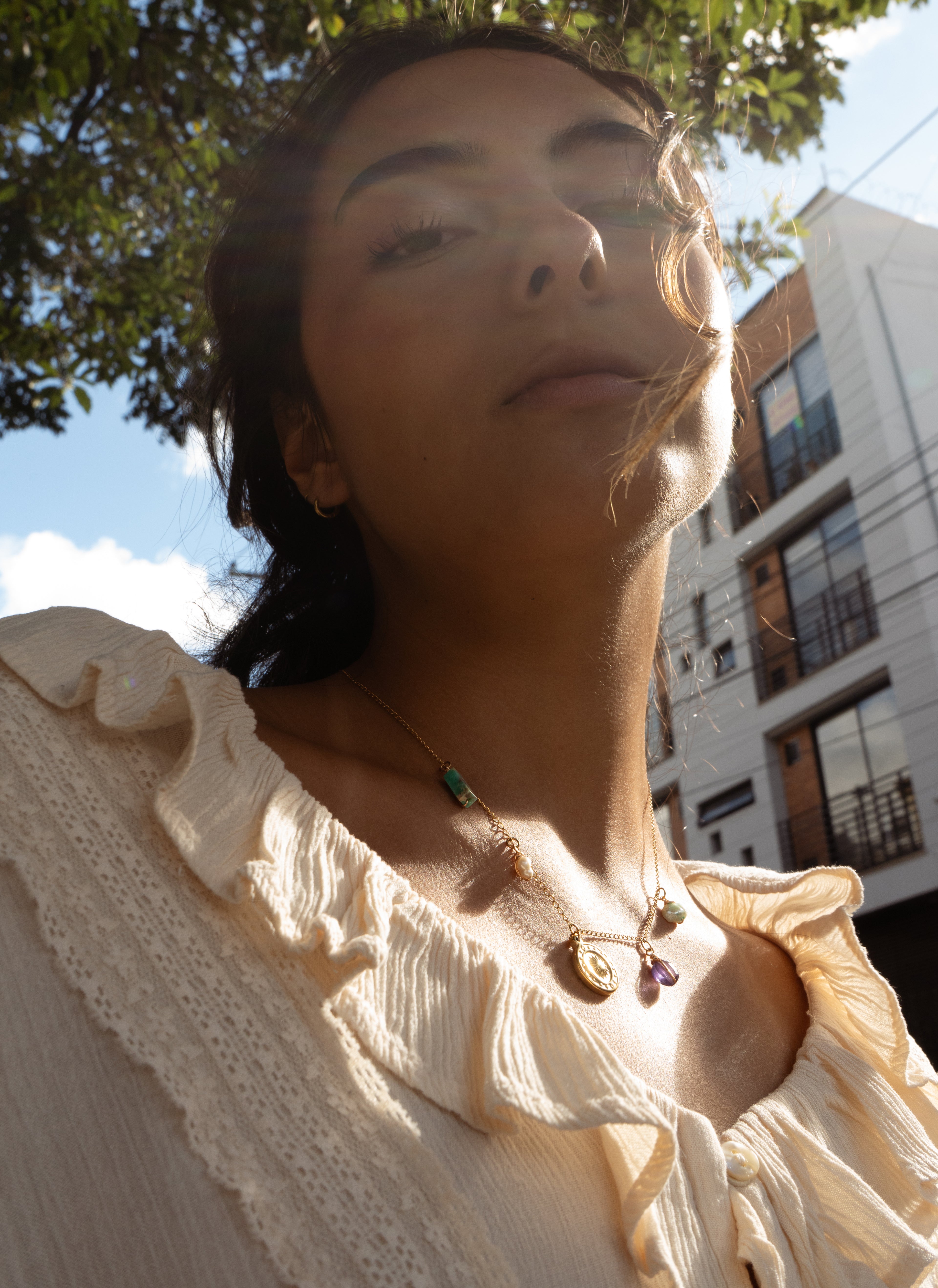 Collar círculo de sol y luna